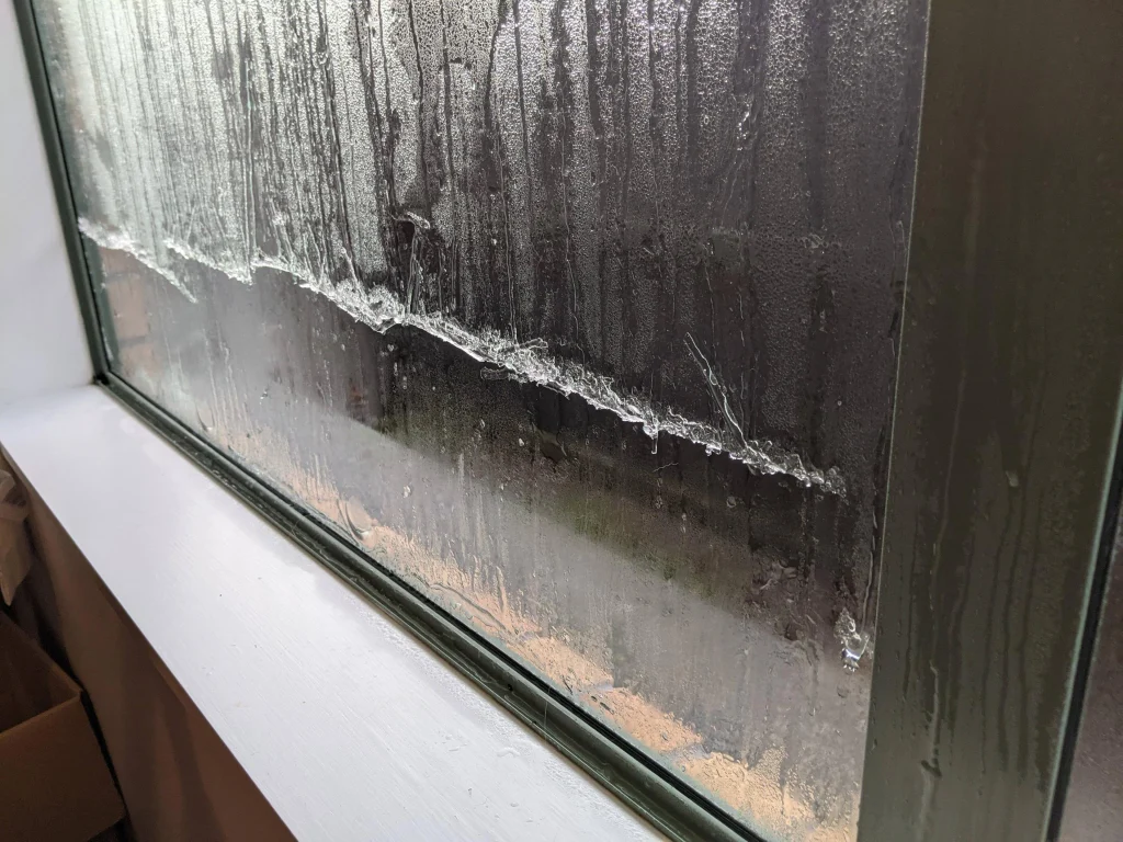 ice inside double-glazed windows